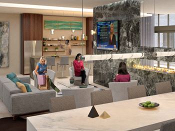 Luxurious club room with catering kitchen and bar with a wall-oven, warming drawers, refrigerators and ice makers, large screen tvs, elegant seating and games